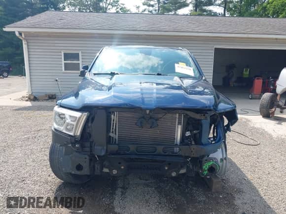 2022 Ram 1500 Big Horn with VIN 1C6SRFBT1NN255976, listed as a IAAI auction lot 42461238 with 56,518 mi miles and . Bid and sale history available at DreamBid. Image 13.