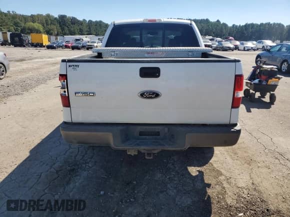 2004 Ford F-150 XLT with VIN 1FTPW14574FA21598, listed as a Copart auction lot 85599995 with 143,186 mi miles and Salvage title. Bid and sale history available at DreamBid. Image 6.