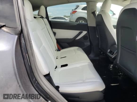 2022 Tesla Model Y Long Range с VIN 7SAYGAEE2NF382147, выставлен на аукционе Copart как лот 69842725 с пробегом 58 197 миль миль и Списание • Salvage title. История ставок и продаж доступна на DreamBid. Изображение 10.