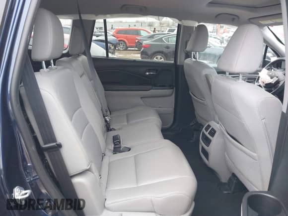 2022 Honda Pilot EX-L with VIN 5FNYF6H53NB010082, listed as a IAAI auction lot 41605798 with 52,733 mi miles and . Bid and sale history available at DreamBid. Image 8.