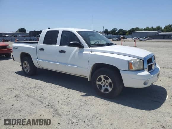 2006 Dodge Dakota SLT with VIN 1D7HW48N46S605943, listed as a Copart auction lot 55553545 with 203,577 mi miles and Clean title. Bid and sale history available at DreamBid. Image 4.