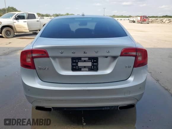 2015 Volvo S60 T5 Drive-E Premier с VIN YV126MFK4F1355600, выставлен на аукционе Copart как лот 68793115 с пробегом Не указан миль и Чистый • Clean title. История ставок и продаж доступна на DreamBid. Изображение 6.