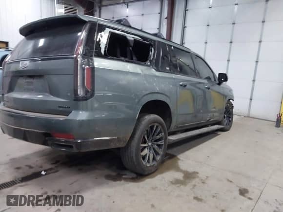 2024 Cadillac Escalade with VIN 1GYS4RKT7RR230923, listed as a IAAI auction lot 41073003 with 9,513 mi miles and . Bid and sale history available at DreamBid. Image 4.