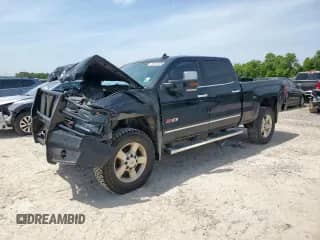 2016 Chevrolet Silverado 2500HD LTZ with VIN 1GC1KWE85GF172323, listed as a Copart auction lot 66330005 with 322,640 mi miles and Salvage title. Bid and sale history available at DreamBid. Image 1.