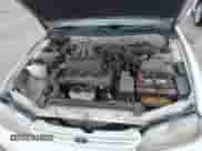 1996 Toyota Camry LE z VIN 4T1BF12K0TU863496, wystawiony jako IAAI lot #42476471 z przebiegiem 272 419 mil mil oraz . Historia ofert i sprzedaży dostępna na DreamBid. Obrazek 10.