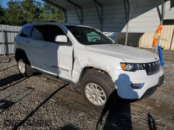 2018 Jeep Grand Cherokee Altitude with VIN 1C4RJEAGXJC197448, listed as a Copart auction lot 84834485 with 55,247 mi miles and Salvage title. Bid and sale history available at DreamBid. Image 4.