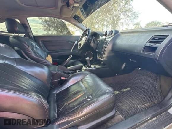 2005 Hyundai Tiburon GT z VIN KMHHN65F85U183258, wystawiony jako Copart lot #86871524 z przebiegiem 281 902 mil mil oraz Czysty tytuł • Clean title. Historia ofert i sprzedaży dostępna na DreamBid. Obrazek 5.