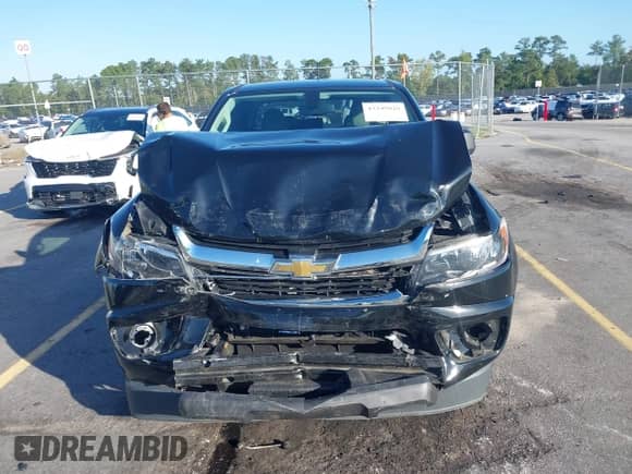 2015 Chevrolet Colorado 2WD WT z VIN 1GCHSAEA0F1173864, wystawiony jako IAAI lot #43349020 z przebiegiem 107 440 mil mil oraz . Historia ofert i sprzedaży dostępna na DreamBid. Obrazek 12.