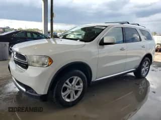 2012 Dodge Durango Crew with VIN 1C4RDJDG8CC198029, listed as a Copart auction lot 80946185 with 204,433 mi miles and Clean title. Bid and sale history available at DreamBid. Image 1.