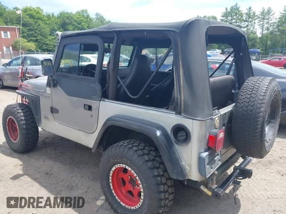 2001 Jeep Wrangler SE with VIN 1J4FA29P01P305939, listed as a IAAI auction lot 42624451 with 170,315 mi miles and . Bid and sale history available at DreamBid. Image 3.