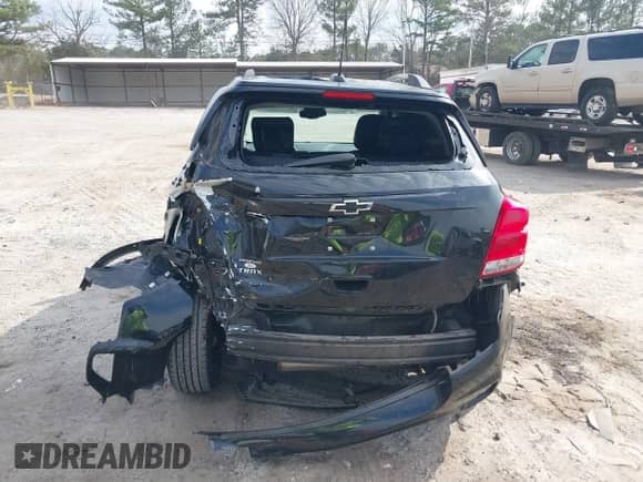 2022 Chevrolet Trax LT with VIN KL7CJLSM7NB513928, listed as a IAAI auction lot 41694269 with 40,639 mi miles and . Bid and sale history available at DreamBid. Image 16.