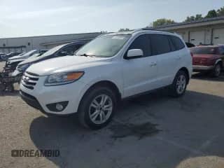 2012 Hyundai Santa Fe Limited с VIN 5XYZK3AB0CG140499, выставлен на аукционе Copart как лот 80169945 с пробегом 224 116 миль миль и Списание • Salvage title. История ставок и продаж доступна на DreamBid. Изображение 1.