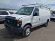 2013 Ford Econoline Cargo Commercial with VIN 1FTNE2EW8DDB33894, listed as a IAAI auction lot 42841415 with 224,026 mi miles and . Bid and sale history available at DreamBid. Image 2.