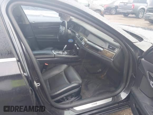 2011 BMW 7 Series 750i xDrive with VIN WBAKC6C54BC394675, listed as a IAAI auction lot 42394276 with 207,246 mi miles and . Bid and sale history available at DreamBid. Image 5.
