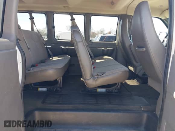 2015 Chevrolet Express Passenger LT with VIN 1GAZG1FGXF1186123, listed as a IAAI auction lot 42023980 with 74,532 mi miles and . Bid and sale history available at DreamBid. Image 8.
