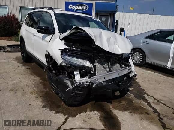 2021 Honda Passport Elite с VIN 5FNYF8H0XMB032322, выставлен на аукционе Copart как лот 68850165 с пробегом 19 751 миль миль и На запчасти • Non repairable. История ставок и продаж доступна на DreamBid. Изображение 15.