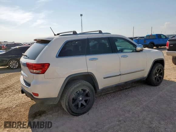 2012 Jeep Grand Cherokee Overland Summit z VIN 1C4RJFCT5CC192127, wystawiony jako Copart lot #63152975 z przebiegiem 144 386 mil mil oraz Czysty tytuł • Clean title. Historia ofert i sprzedaży dostępna na DreamBid. Obrazek 3.