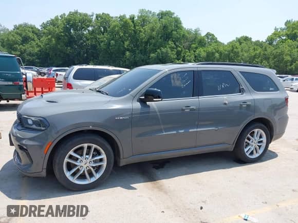 2023 Dodge Durango R/T Plus with VIN 1C4SDJCT1PC555850, listed as a IAAI auction lot 42465738 with 52,627 mi miles and . Bid and sale history available at DreamBid. Image 13.