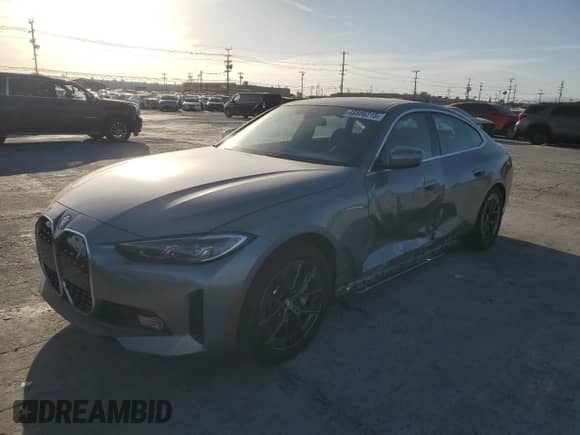 2024 BMW i4 eDrive35 with VIN WBY43AW06RFS38949, listed as a Copart auction lot 46886215 with 11,924 mi miles and Salvage title. Bid and sale history available at DreamBid. Image 1.