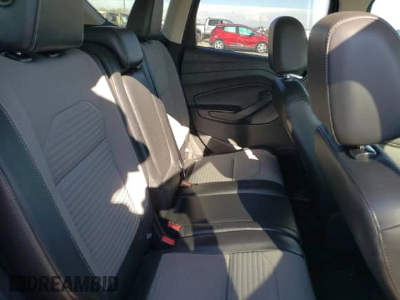 2017 Ford Escape Titanium z VIN 1FMCU9JD2HUC02846, wystawiony jako Copart lot #71730795 z przebiegiem 172 823 mil mil oraz Szkoda całkowita • Salvage title. Historia ofert i sprzedaży dostępna na DreamBid. Obrazek 11.