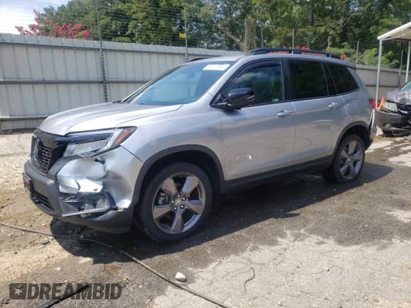 2020 Honda Passport Touring с VIN 5FNYF8H96LB011464, выставлен на аукционе Copart как лот 69017995 с пробегом 58 459 миль миль и Списание • Salvage title. История ставок и продаж доступна на DreamBid. Изображение 1.