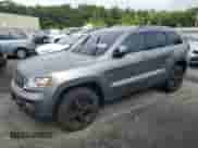 2012 Jeep Grand Cherokee Laredo with VIN 1C4RJFAG1CC293722, listed as a Copart auction lot 68848665 with 114,707 mi miles and Salvage title. Bid and sale history available at DreamBid. Image 1.