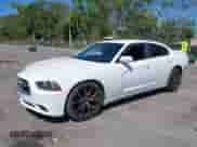 2014 Dodge Charger SE with VIN 2C3CDXBG9EH315018, listed as a IAAI auction lot 41754604 with 103,676 mi miles and . Bid and sale history available at DreamBid. Image 17.