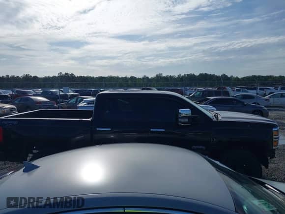 2014 Chevrolet Silverado 1500 High Country with VIN 3GCUKTEC7EG272127, listed as a IAAI auction lot 42465267 with 190,924 mi miles and . Bid and sale history available at DreamBid. Image 13.