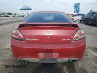 2007 Hyundai Tiburon GT с VIN KMHHN66F27U238272, выставлен на аукционе Copart как лот 59218205 с пробегом 218 279 миль миль и Списание • Salvage title. История ставок и продаж доступна на DreamBid. Изображение 6.