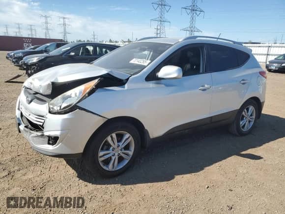 2011 Hyundai Tucson GLS z VIN KM8JU3AC5BU168985, wystawiony jako Copart lot #70140285 z przebiegiem 86 951 mil mil oraz Szkoda całkowita • Salvage title. Historia ofert i sprzedaży dostępna na DreamBid. Obrazek 1.