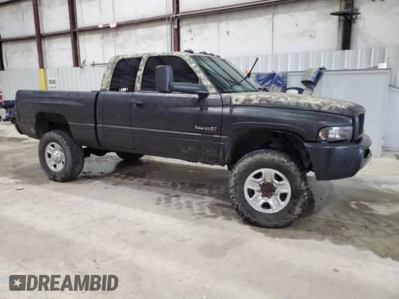 2002 Dodge 2500 с VIN 3B7KF23C22M299340, выставлен на аукционе Copart как лот 54511685 с пробегом 291 236 миль миль и Списание • Salvage title. История ставок и продаж доступна на DreamBid. Изображение 4.