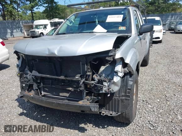 2017 Nissan Frontier SV with VIN 1N6BD0CT1HN744785, listed as a IAAI auction lot 43117404 with 98,123 mi miles and . Bid and sale history available at DreamBid. Image 2.