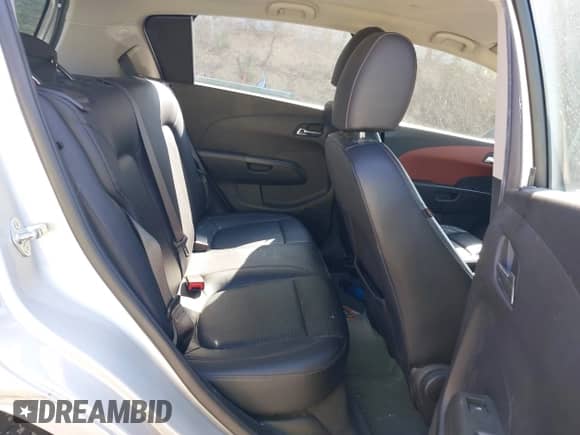 2013 Chevrolet Sonic LTZ with VIN 1G1JE6SB6D4120979, listed as a IAAI auction lot 43062725 with 51,074 mi miles and . Bid and sale history available at DreamBid. Image 8.