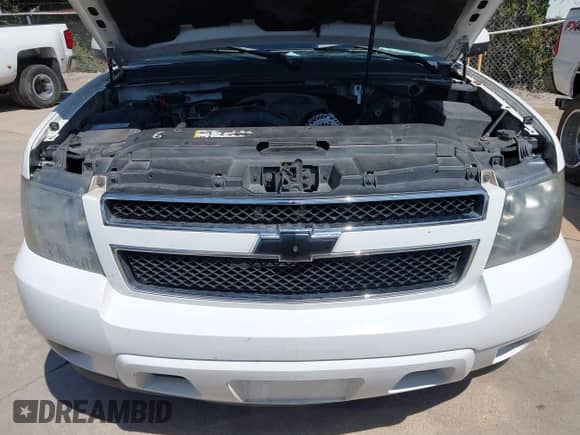 2007 Chevrolet Tahoe LS z VIN 1GNFC13007R310861, wystawiony jako IAAI lot #42621401 z przebiegiem 241 291 mil mil oraz . Historia ofert i sprzedaży dostępna na DreamBid. Obrazek 10.