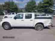 2016 Nissan Frontier SV z VIN 1N6AD0EV5GN795909, wystawiony jako IAAI lot #43356457 z przebiegiem 148 664 mil mil oraz . Historia ofert i sprzedaży dostępna na DreamBid. Obrazek 14.