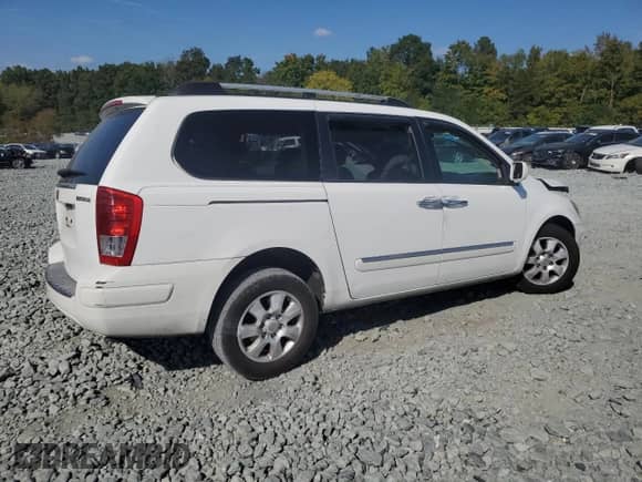 2007 Hyundai Entourage GLS с VIN KNDMC233876033037, выставлен на аукционе Copart как лот 84786415 с пробегом 296 766 миль миль и Списание • Salvage title. История ставок и продаж доступна на DreamBid. Изображение 3.