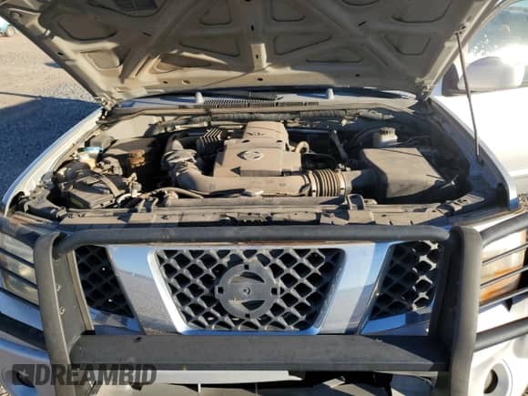 2006 Nissan Frontier LE with VIN 1N6AD07U66C416785, listed as a Copart auction lot 82629405 with 174,566 mi miles and Salvage title. Bid and sale history available at DreamBid. Image 11.