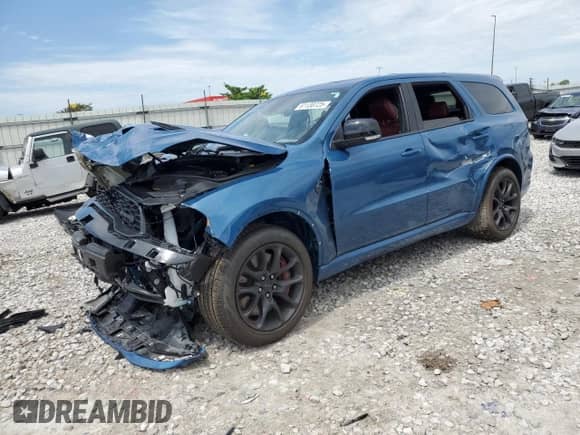 2024 Dodge Durango SRT Hellcat Premium with VIN 1C4SDJH98RC101692, listed as a Copart auction lot 61130725 with 6,927 mi miles and Salvage title. Bid and sale history available at DreamBid. Image 1.