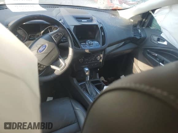 2017 Ford Escape Titanium with VIN 1FMCU0JD4HUD74615, listed as a Copart auction lot 80097925 with 54,877 mi miles and Clean title. Bid and sale history available at DreamBid. Image 8.