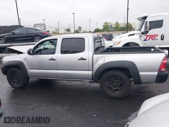 2012 Toyota Tacoma with VIN 5TFJX4CN3CX015697, listed as a IAAI auction lot 42164564 with 183,622 mi miles and . Bid and sale history available at DreamBid. Image 15.