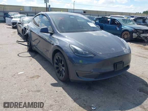 2023 Tesla Model Y Long Range with VIN 7SAYGDEE8PA163534, listed as a IAAI auction lot 42795393 with 45,172 mi miles and . Bid and sale history available at DreamBid. Image 1.