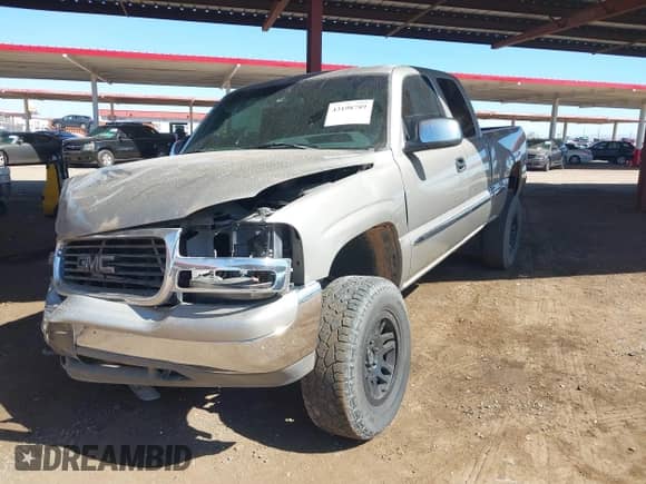 2002 GMC Sierra 1500 SLE z VIN 2GTEK19T721381162, wystawiony jako IAAI lot #43198789 z przebiegiem 301 974 mil mil oraz . Historia ofert i sprzedaży dostępna na DreamBid. Obrazek 2.