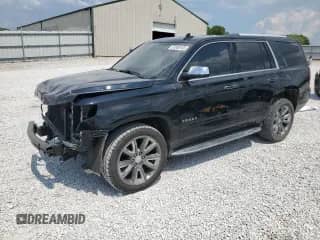 2015 Chevrolet Tahoe LTZ с VIN 1GNSKCKC1FR691644, выставлен на аукционе Copart как лот 67600165 с пробегом 125 887 миль миль и Списание • Salvage title. История ставок и продаж доступна на DreamBid. Изображение 1.