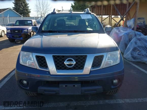 2013 Nissan Frontier SV with VIN 1N6AD0EV6DN731096, listed as a IAAI auction lot 41424331 with 121,534 mi miles and . Bid and sale history available at DreamBid. Image 13.