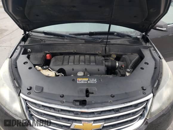 2013 Chevrolet Traverse LT with VIN 1GNKRGKD3DJ223048, listed as a Copart auction lot 82299685 with 186,621 mi miles and Clean title. Bid and sale history available at DreamBid. Image 12.