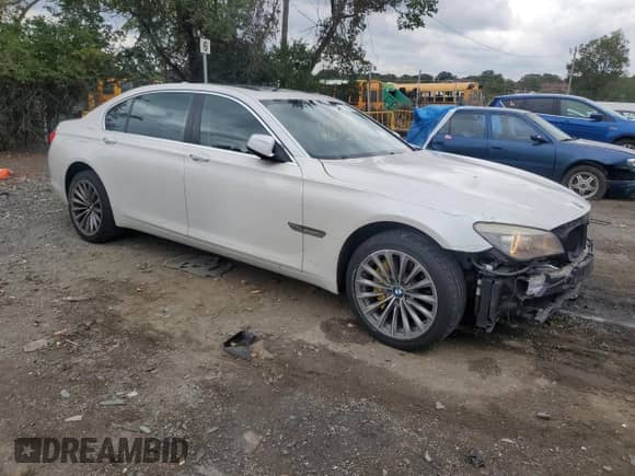 2011 BMW 7 Series 740Li with VIN WBAKB4C55BC574125, listed as a Copart auction lot 71612445 with 119,308 mi miles and Salvage title. Bid and sale history available at DreamBid. Image 4.