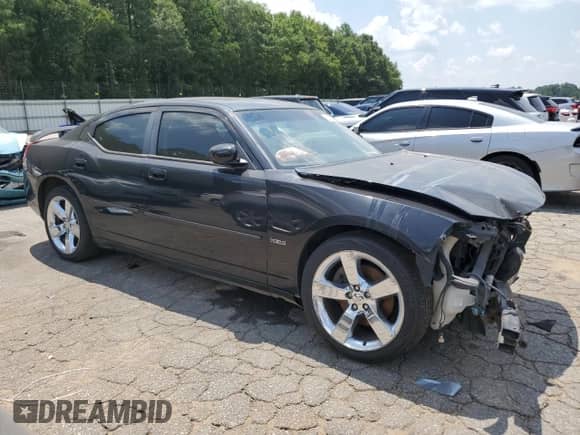 2010 Dodge Charger R/T с VIN 2B3CA5CT3AH172325, выставлен на аукционе Copart как лот 63321335 с пробегом 257 870 миль миль и Списание • Salvage title. История ставок и продаж доступна на DreamBid. Изображение 4.