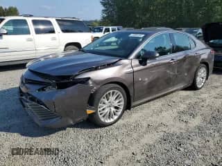 2020 Toyota Camry Hybrid XLE with VIN 4T1F31AK4LU529256, listed as a Copart auction lot 72095185 with 22,302 mi miles and Salvage title. Bid and sale history available at DreamBid. Image 1.