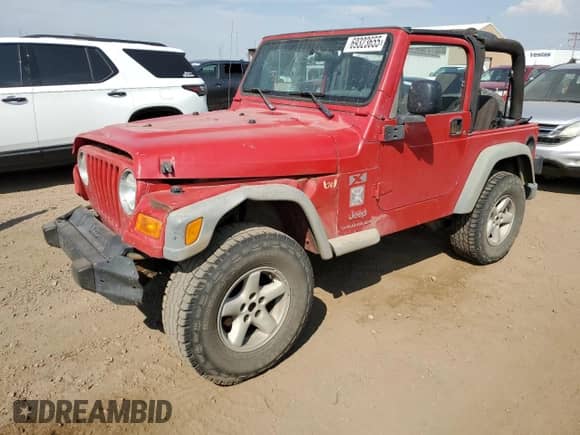2003 Jeep Wrangler X z VIN 1J4FA39S33P308881, wystawiony jako Copart lot #69323655 z przebiegiem 264 257 mil mil oraz Szkoda całkowita • Salvage title. Historia ofert i sprzedaży dostępna na DreamBid. Obrazek 1.
