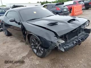 2023 Dodge Challenger R/T Scat Pack with VIN 2C3CDZFJXPH610827, listed as a IAAI auction lot 42640271 with 28,599 mi miles and . Bid and sale history available at DreamBid. Image 1.